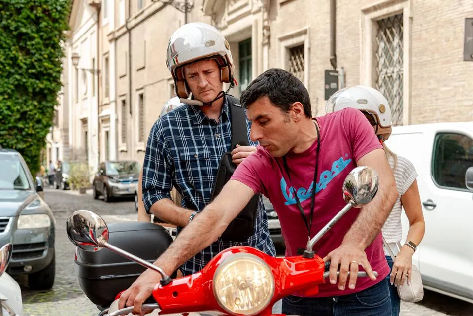 Confident rider on a self-drive Vespa tour