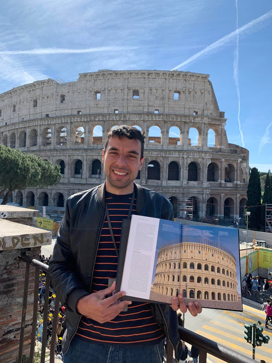 Francesco outside the Colosseum, showing how it originally looked