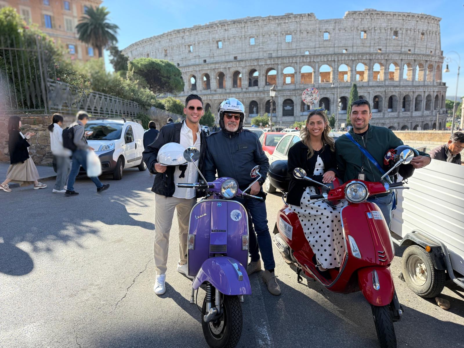 Riding as a passenger on a guided Vespa tour in Rome