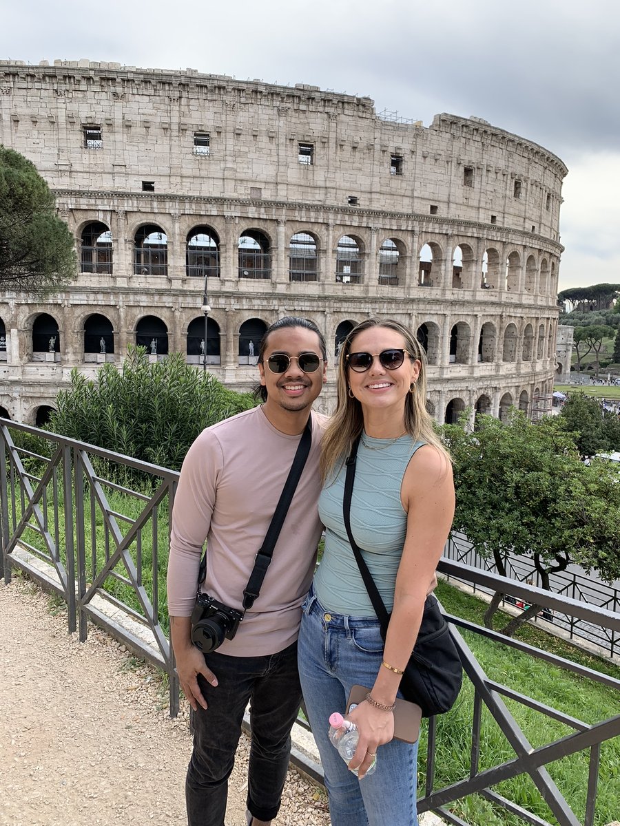 A couple outside the Colosseum on the walking tour