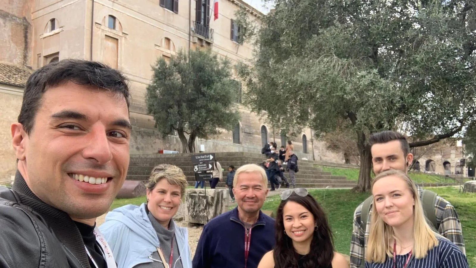 A small group on the walking tour by the Roman Forum